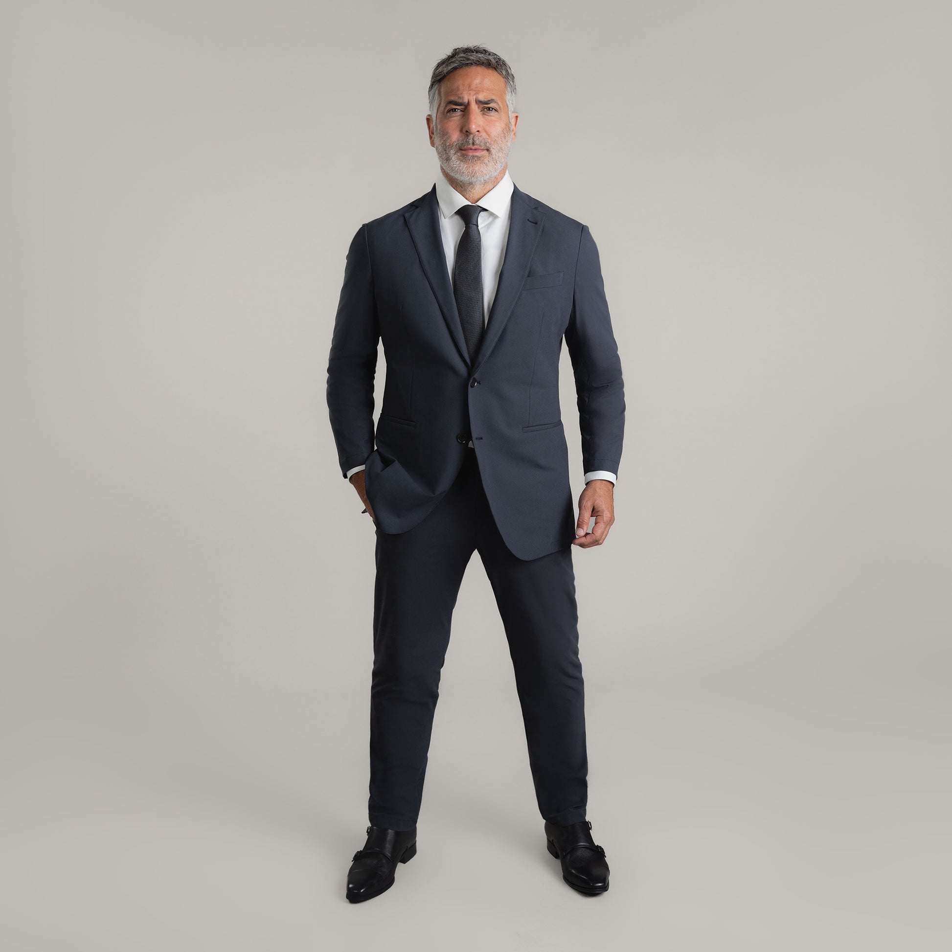 Bespoke Custom Athleisure Technical Men's Suit Los Angeles model Guillermo in Charcoal