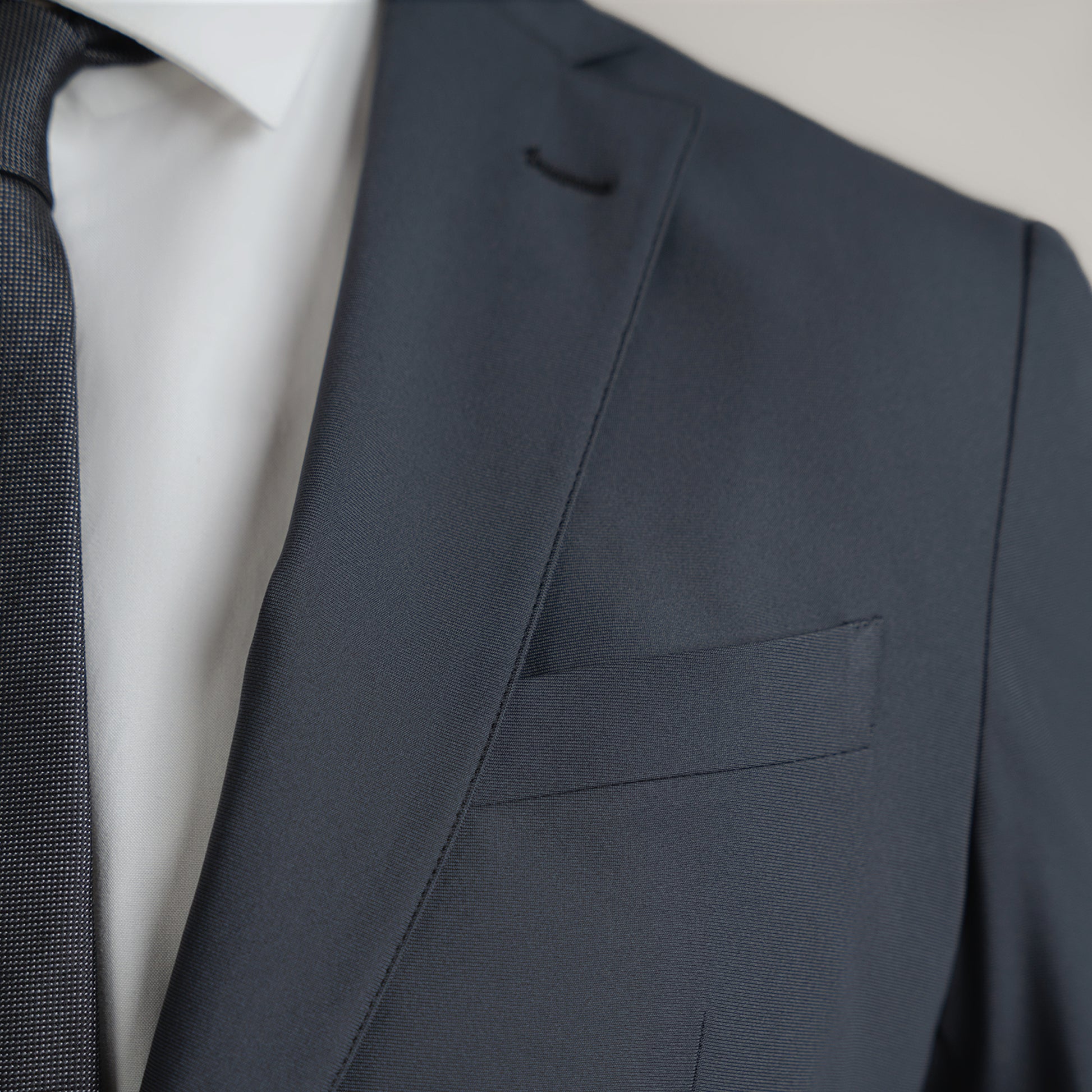 Bespoke Custom Athleisure Technical Men's Suit Los Angeles model Guillermo in Charcoal