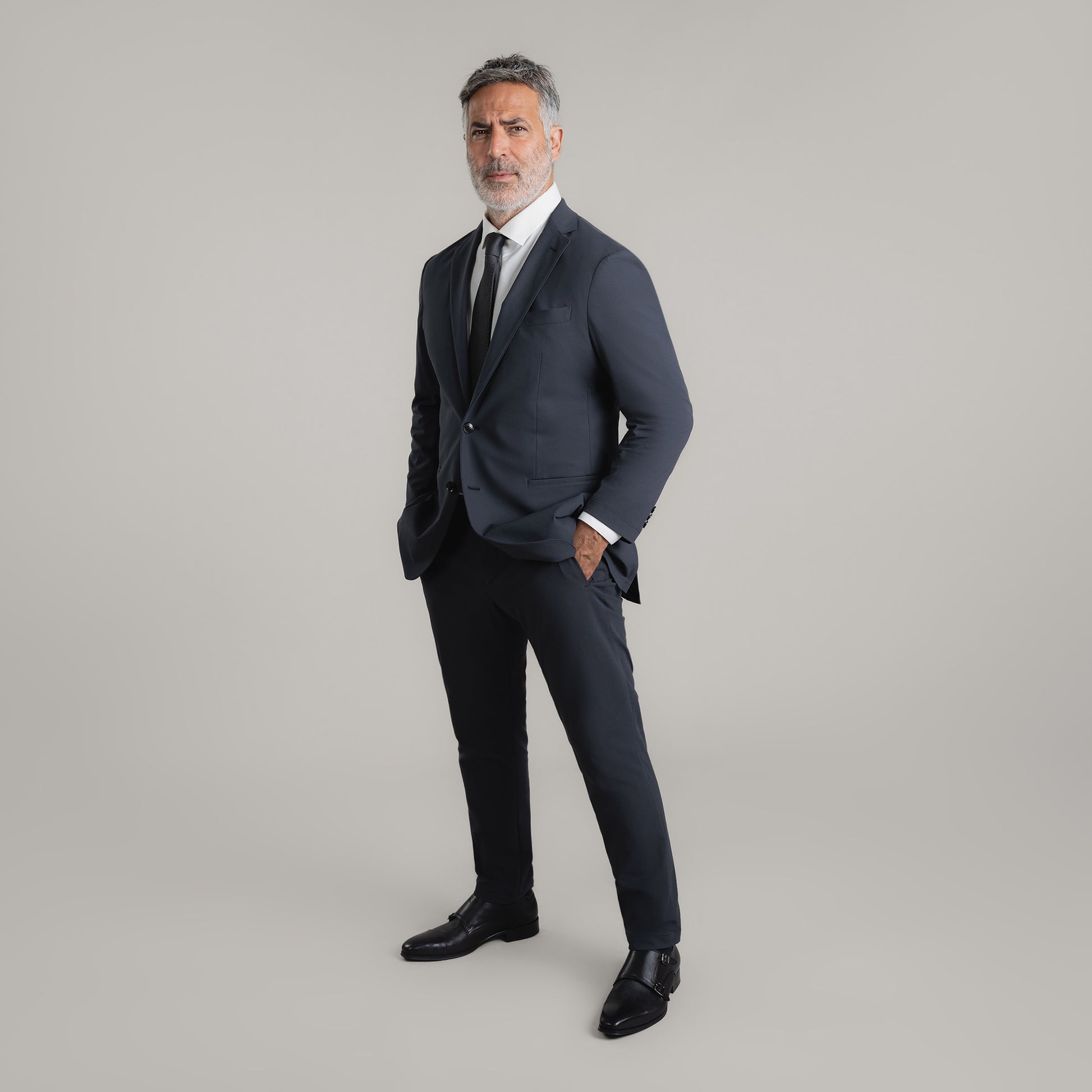 Bespoke Custom Athleisure Technical Men's Suit Los Angeles model Guillermo in Charcoal