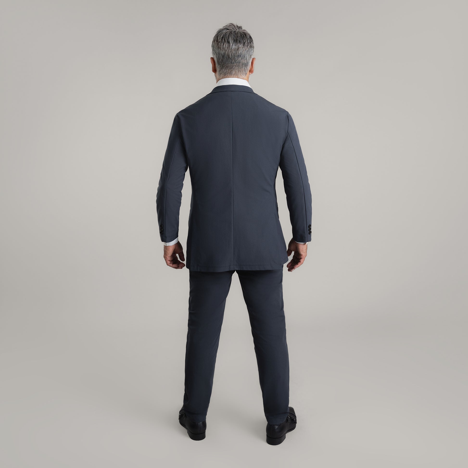 Bespoke Custom Athleisure Technical Men's Suit Los Angeles model Guillermo in Charcoal