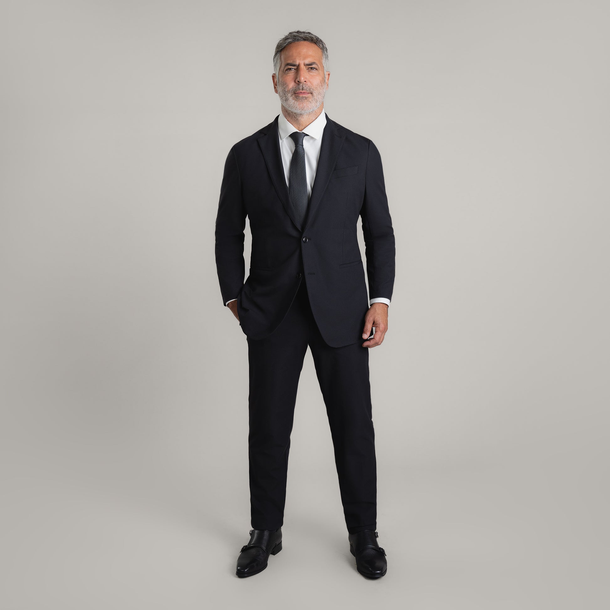 Bespoke Custom Athleisure Technical Men's Suit Los Angeles model Guillermo in Black
