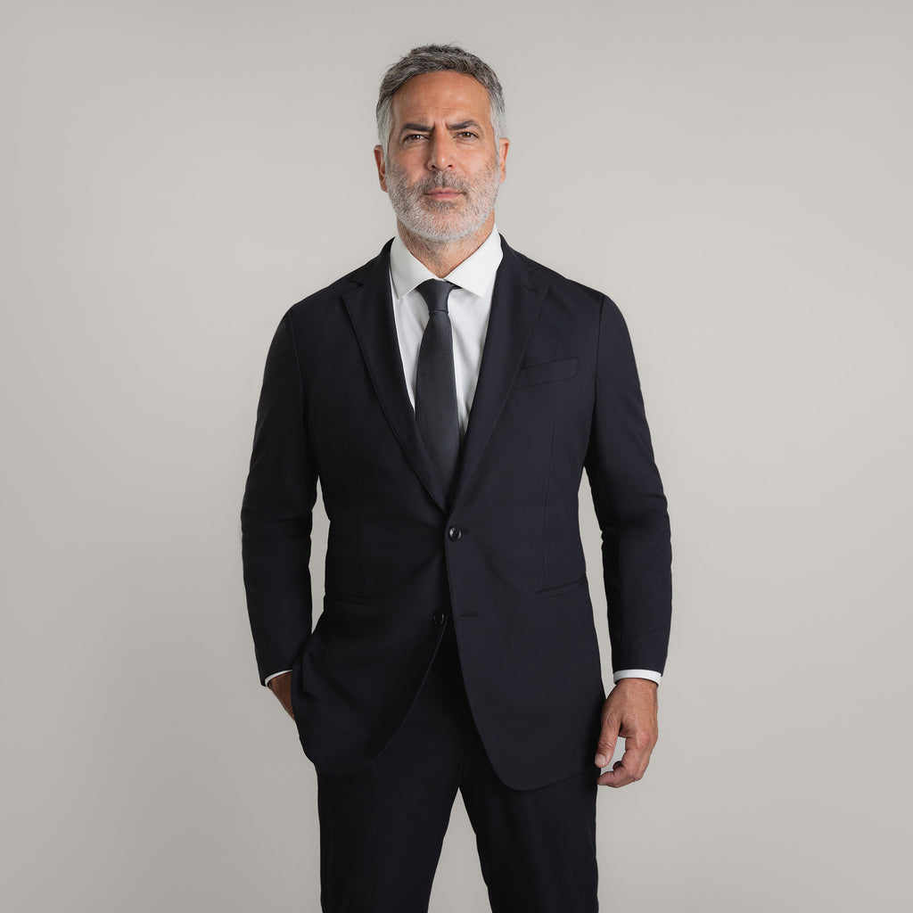 Bespoke Custom Athleisure Technical Men's Suit Los Angeles model Guillermo in Black