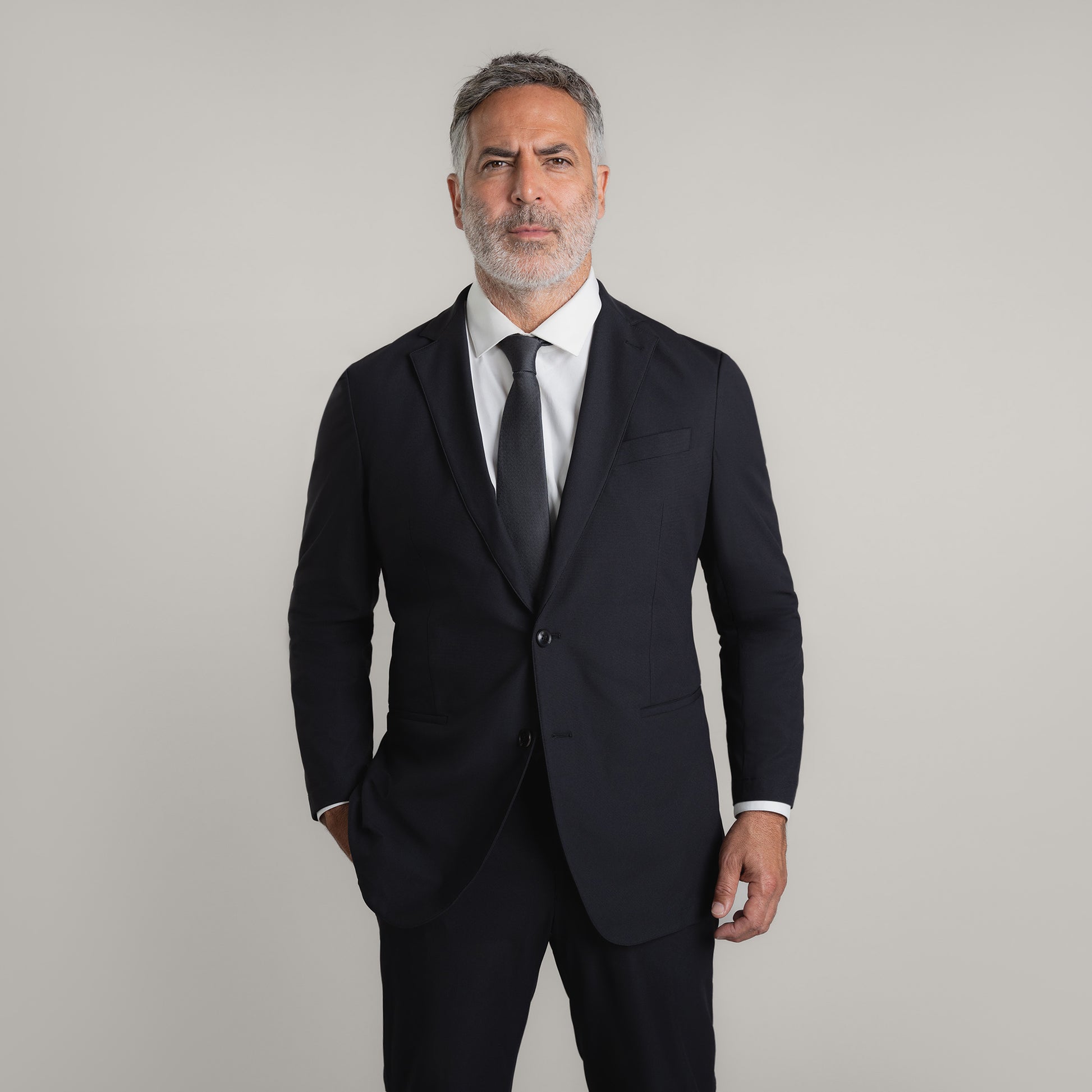 Bespoke Custom Athleisure Technical Men's Suit Los Angeles model Guillermo in Black