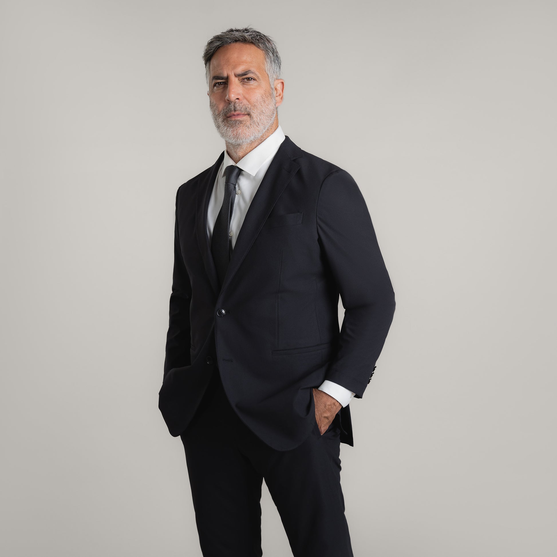 Bespoke Custom Athleisure Technical Men's Suit Los Angeles model Guillermo in Black