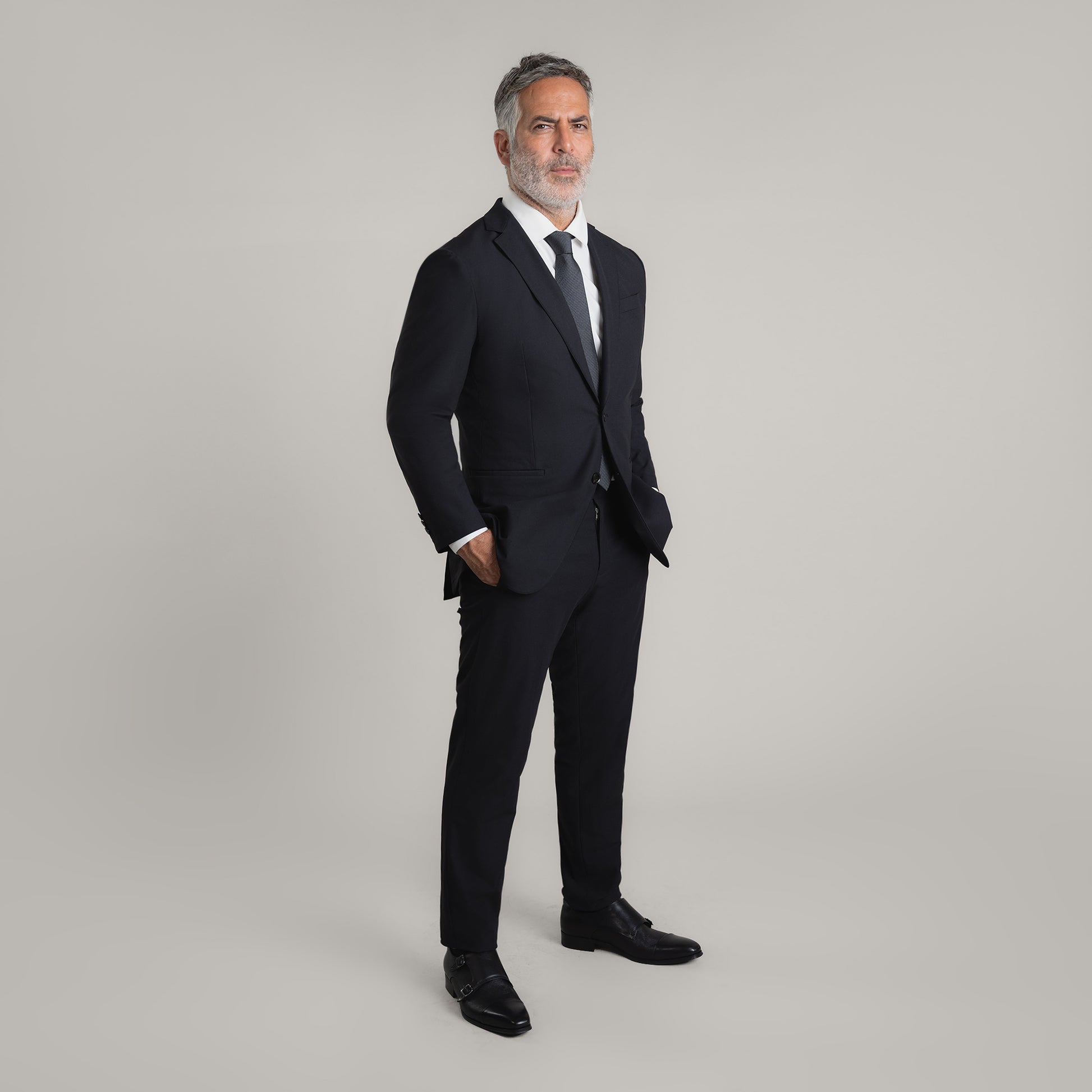 Bespoke Custom Athleisure Technical Men's Suit Los Angeles model Guillermo in Black