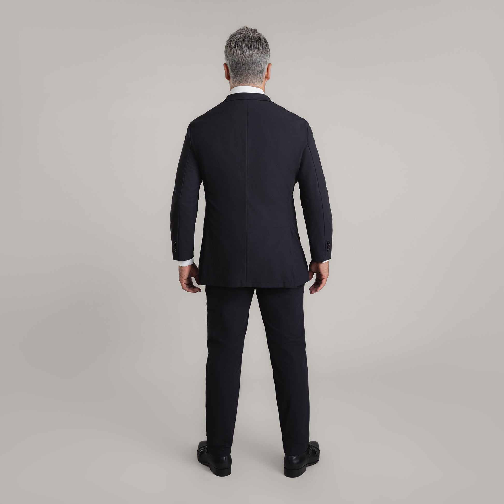 Bespoke Custom Athleisure Technical Men's Suit Los Angeles model Guillermo in Black