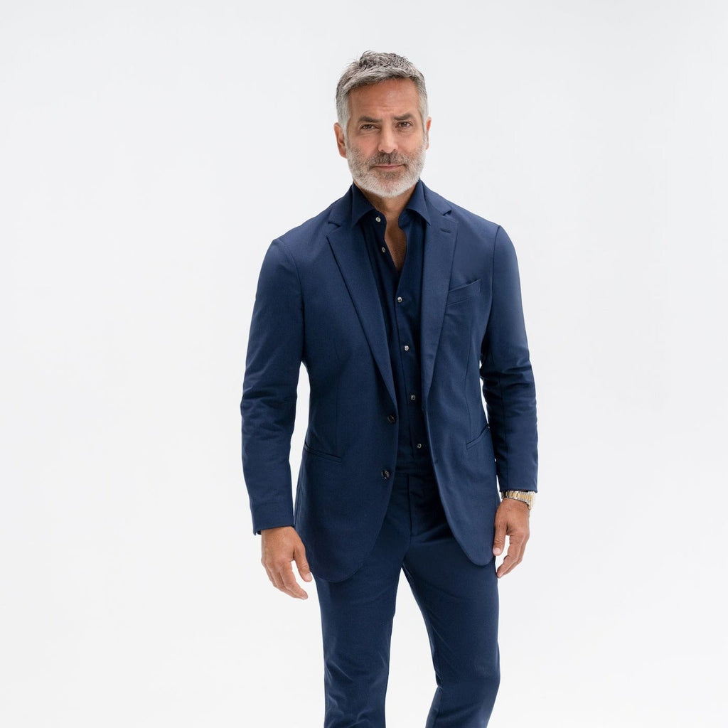 Bespoke custom athleisure technical athletic stretch suit los angeles model Guillermo in Navy